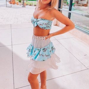 Light blue floral two piece, tie up, and skirt